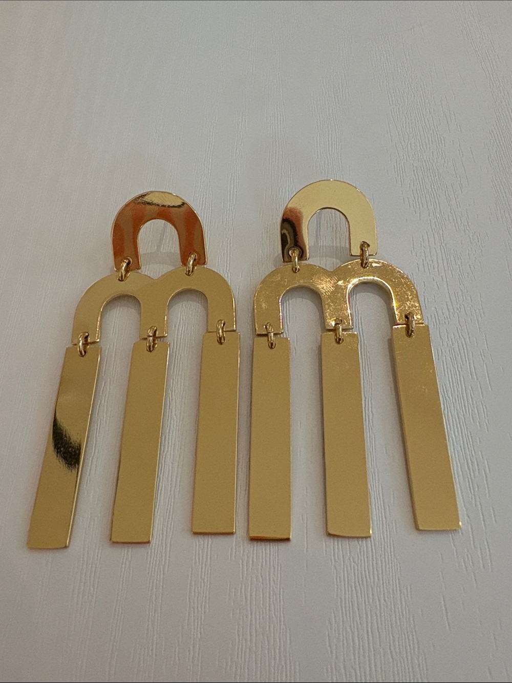 Gold Tone Modern Arch Drop Earrings